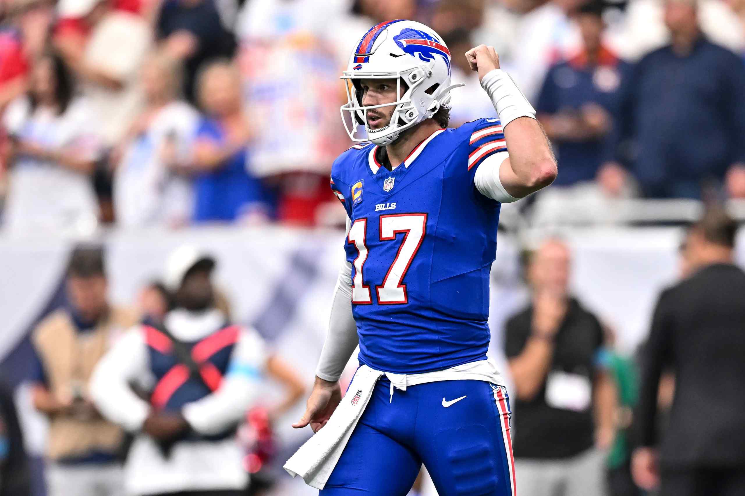 Josh Allen fist-pumping while playing for the Buffalo Bills.